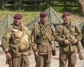 Men dressed in wartime US army soldiers uniform reenacting military maneuvers during Victory Day Europe Celebration Event