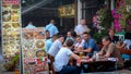 Men drinking beer at a restaurant in the Bascarsija neighbourhood, Sarajevo