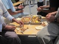 Men are eating fish Royalty Free Stock Photo