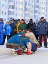 Men are engaged in fight in national Nenets clothes