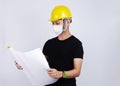 Men Engineer portrait wearing mask for protect pm2.5 and Covid-19 with hand holding drwing paper on white backgrounds