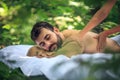 Men enjoy at back massage. Royalty Free Stock Photo