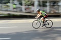 Men exercise by cycling in sunday morning