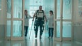 A man in the exosuit is walking with doctors& x27; aid