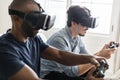 Men experiencing virtual reality with VR headset