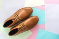 Men fashion shoe on color paper background