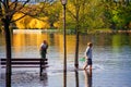 Men fish with nets in the flooded Park in Ottawa Royalty Free Stock Photo
