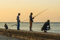 Men fishing at Malecon Havana