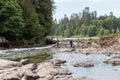 Men fishing on the river