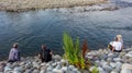 Men fishing on the Saigawa River, in summer, Kanazawa, Ishikawa Prefecture, Western Japan