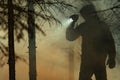 Men with Flashlight During Forest Wildfire Rescue Mission Royalty Free Stock Photo