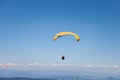Men Flying in Paragliders in Blue Sky on a Sunny Day Royalty Free Stock Photo