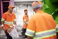 Men, garbage truck and worker in group on street for cleaning, public service and recycling for ecology. People, team Royalty Free Stock Photo