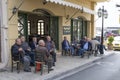 Men sitting at cafe in Archanes in Crete