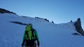 Men on glacier on the way to the summit