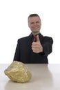 Men with a gold nugget Royalty Free Stock Photo