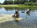 Men,gold panning Royalty Free Stock Photo