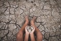 Men on ground cracked dry due to drought. Royalty Free Stock Photo