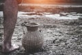 Men on ground cracked dry due to drought. Royalty Free Stock Photo