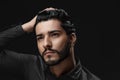 Men Hair Care. Man With Beard, Beauty Face Touching Black Hair Royalty Free Stock Photo