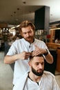 Men Hair Salon. Man Barber Doing Hairstyle In Barbershop Royalty Free Stock Photo