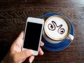 Men hand use smartphone in coffee shop.