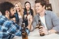 Men with hands clasped in arm wrestling challenge