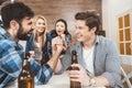 Men with hands clasped in arm wrestling challenge