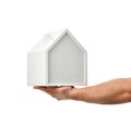 Men hands hold little house model isolated on white background. Property real estate Investment concept Royalty Free Stock Photo