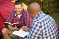 Multi-Ethnic group of friends talking and having a bible study. Royalty Free Stock Photo