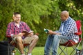 Multi-Ethnic group of friends talking and having a bible study.