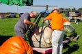 Men help move Giant pumpkin