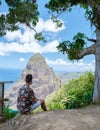 Men hiking in Saint Lucia Caribbean, nature trail in the jungle of Saint Lucia huge Pitons Royalty Free Stock Photo