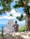 Men hiking in Saint Lucia Caribbean, nature trail in the jungle of Saint Lucia huge Pitons Royalty Free Stock Photo