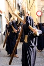 Men holding crucifix, Easter procession in Jerez
