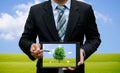 Men holding touch screen tablet technology environment and ecology Royalty Free Stock Photo