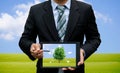 Men holding touch screen tablet technology environment and ecology