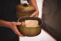 Men holds pan with free food