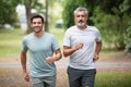 men jogging outdoor in nature - motion blur image panning Royalty Free Stock Photo