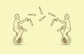 Men juggling pins while cycling together Royalty Free Stock Photo