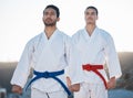 Men, karate team and outdoor training with mindset, thinking and start workout in morning for development. Martial arts