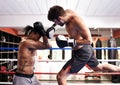 Men, kickboxing and jumping for match in ring, fitness and topless for exercise and workout. People, bodybuilders and Royalty Free Stock Photo