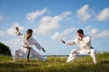 Men Kicking Punching Fighting During Combat Sport Karate Simulation