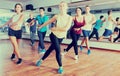 Men and ladies dancing zumba Royalty Free Stock Photo