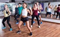 Men and ladies dancing zumba Royalty Free Stock Photo