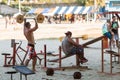 Men Lift Weights With Crude Equipment At Outdoor Brazil Gym