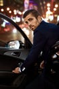 Men in luxury car. Night life. Royalty Free Stock Photo