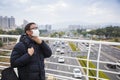 Men in medical mask with sore throat Royalty Free Stock Photo