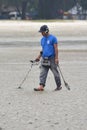 Men With Metal Detector