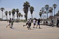 Men with mixed ethnicity playing basketball